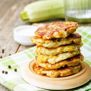 Corn Zucchini Fritters With Avocado Cream